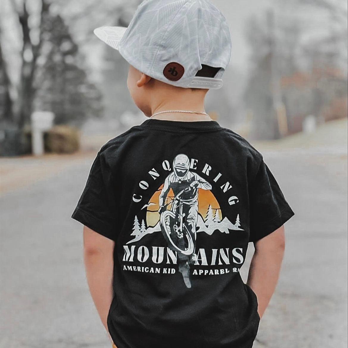 Conquering Mountains Graphic Tee